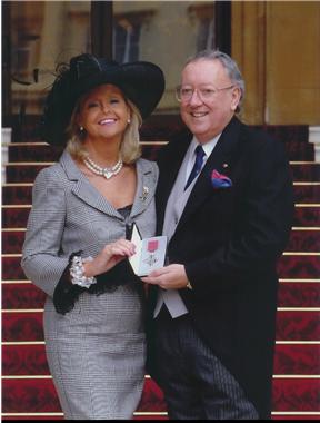 Bob-and-his-partner-Laura-with-his-MBE-13.jpg